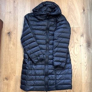 Simons hooded long down lined puffer coat.